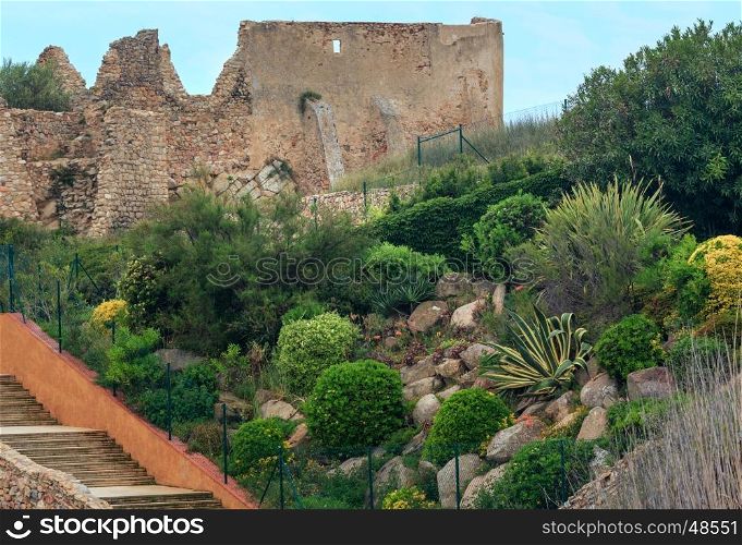 Sant Esteve de Mar castle ruins and plants, Palamos, Girona, Costa Brava, Spain.