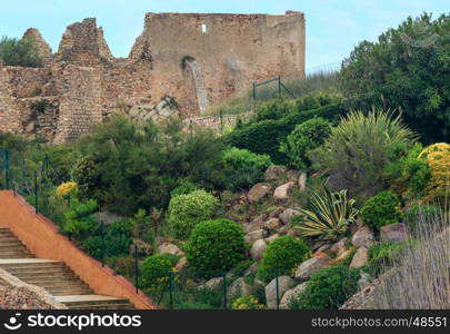 Sant Esteve de Mar castle ruins and plants, Palamos, Girona, Costa Brava, Spain.