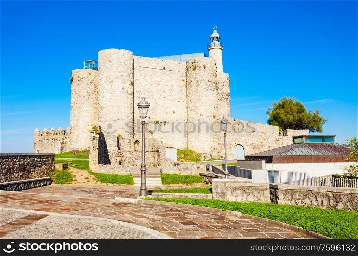 Santa Ana Castle or Castillo de Santa Ana and Lighthouse in Castro Urdiales, small city in Cantabria region in northern Spain