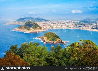 Santa Clara Island and San Sebastian Donostia city aerial panoramic view, Basque country in Spain