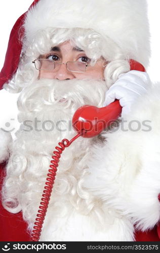 Santa Claus at the phone over white background