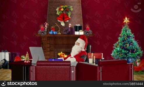 Santa Claus at work checking blood pressure, office with Christmas decorations