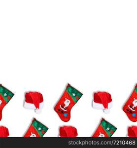 Santa Claus christmas red hat and christmas sock isolated on white background. Christmas seamless pattern. Copy space.