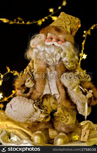 Santa Claus Doll on dark background.