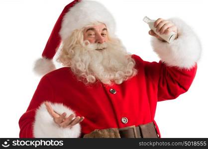Santa Claus drinking milk from bottle isolated on white background. Healthy lifestyle promotion
