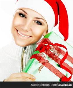 Santa Claus girl closeup portrait, holding holiday present &amp; gift box as Christmas &amp; new year ornament decoration isolated on white background