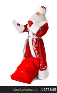 santa claus is creating wish list, isolated on white