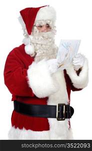 Santa Claus looking a drawing over white background