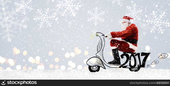 Santa Claus on scooter. Santa Claus on scooter driving at Christmas or New Year snowy gray background