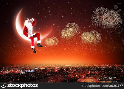 Santa Claus on the moon above a city at night