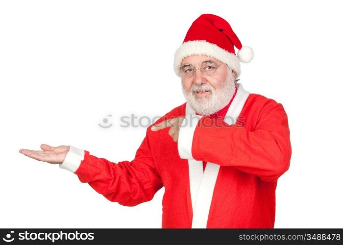 Santa Claus pointing to the outstretched palm of your hand on white background