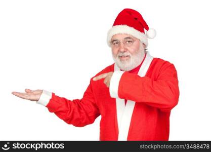 Santa Claus pointing to the outstretched palm of your hand on white background
