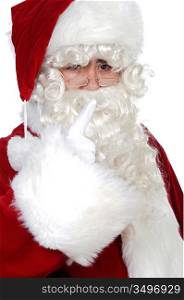 Santa Claus pointing with his finger over white background