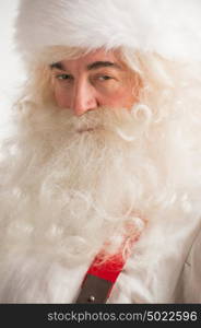 Santa Claus portrait smiling isolated over a white background