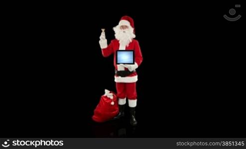 Santa Claus presenting a blank tablet, against black