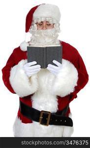Santa Claus reading a book over white background