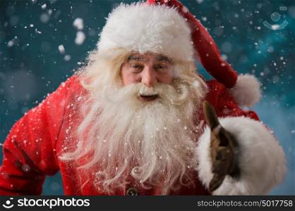 Santa Claus running outdoors at North Pole. Trying to be in time working on delivery gifts to children