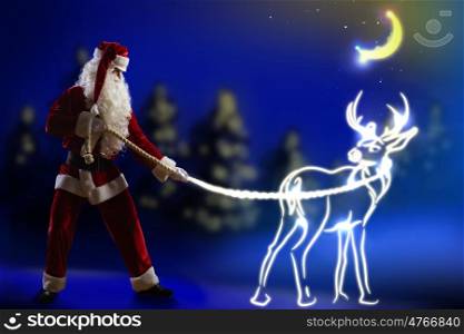 Santa Claus. Santa Claus and christmas deer on lace