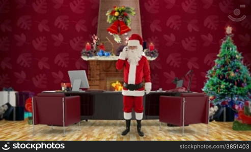 Santa Claus talking on mobile in his modern Christmas Office