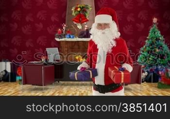 Santa Claus weighting presents in his modern Christmas Office