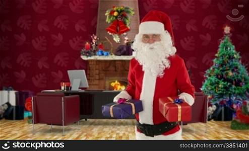 Santa Claus weighting presents in his modern Christmas Office