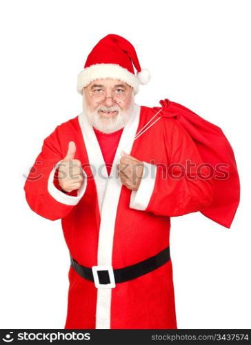Santa Claus with a full sack saying OK isolated on white background