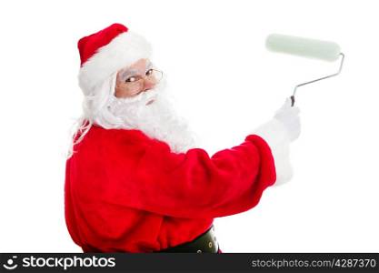 Santa Claus with a paint roller, working on a home improvement project. Isolated on white.