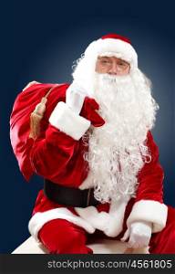 santa claus with his gift bag. Santa Claus with his magic gift red bag full of presents