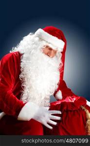 santa claus with his gift bag. Santa Claus with his magic gift red bag full of presents