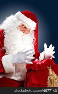 santa claus with his gift bag. Santa Claus with his magic gift red bag full of presents