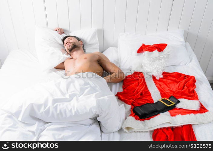 Santa getting ready for Christmas. Santa Claus in hotel room without costume getting ready for Christmas or New Year