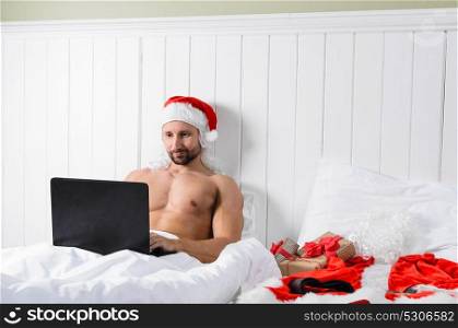 Santa getting ready for Christmas. Santa Claus in hotel room without costume shopping for Christmas or New Year