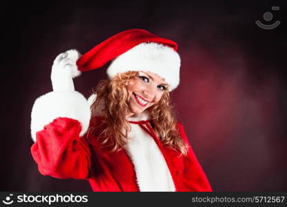 Santa girl face on the red black background