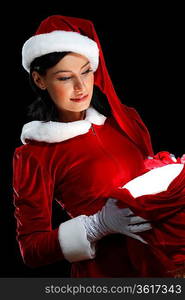 Santa Girl presenting your product, in costume and white gloves