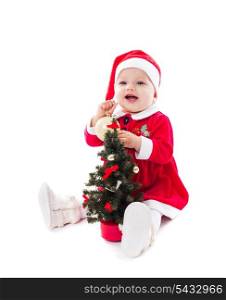 Santa girl wants to decorate fir tree isolated on white