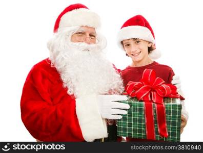 Santa giving a Christmas gift to a cute little boy. Isolated on white.