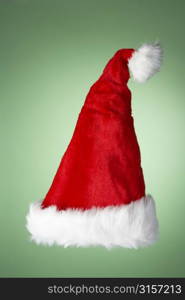 Santa Hat Against Green Background