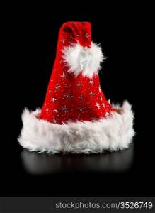 santa hat with stars isolated on black