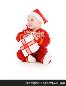 santa helper baby with christmas gift over white