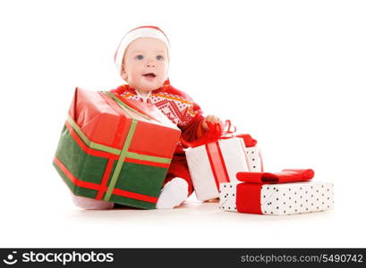 santa helper baby with christmas gifts over white