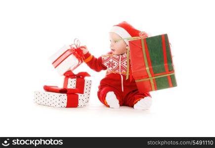 santa helper baby with christmas gifts over white