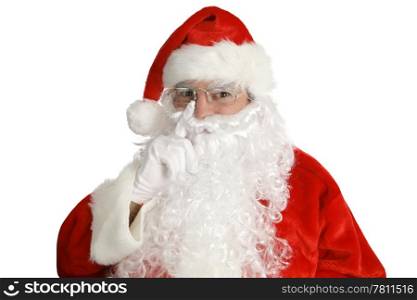 Santa Laying his finger aside of his nose and giving a nod... Isolated on white.