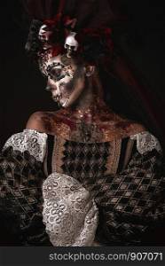 Santa Muerte Halloween Young Girl with creative scull Makeup. Halloween Girl in a Death Costume