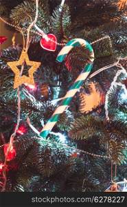 Santa staff lollipop on the Christmas tree