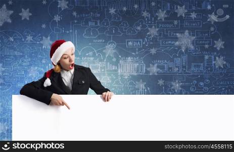 Santa with banner. Santa woman pointing with finger at blank banner. Place for your text