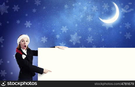 Santa with banner. Santa woman pointing with finger at blank banner. Place for your text