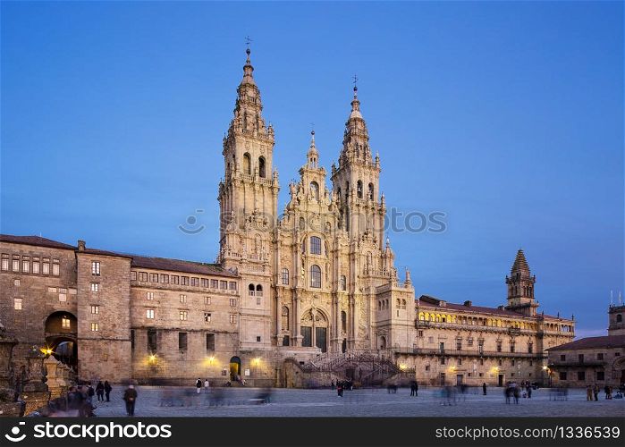 Santiago de Compostela Cathedral view from Obradoiro square at twilight. Cathedral of Saint James. Galicia, Spain