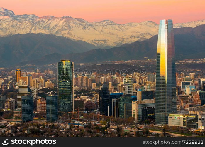 Santiago, Region Metropolitana, Chile - Skyline of modern buildings at financial district with The Andes mountain range in the back.