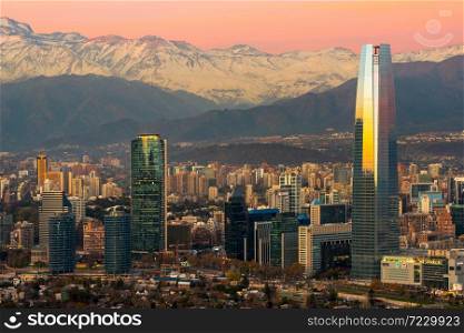 Santiago, Region Metropolitana, Chile - Skyline of modern buildings at financial district with The Andes mountain range in the back.