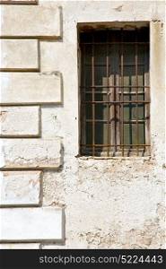 santo antonino window varese palaces italy abstract sunny day wood venetian blind in the concrete brick
